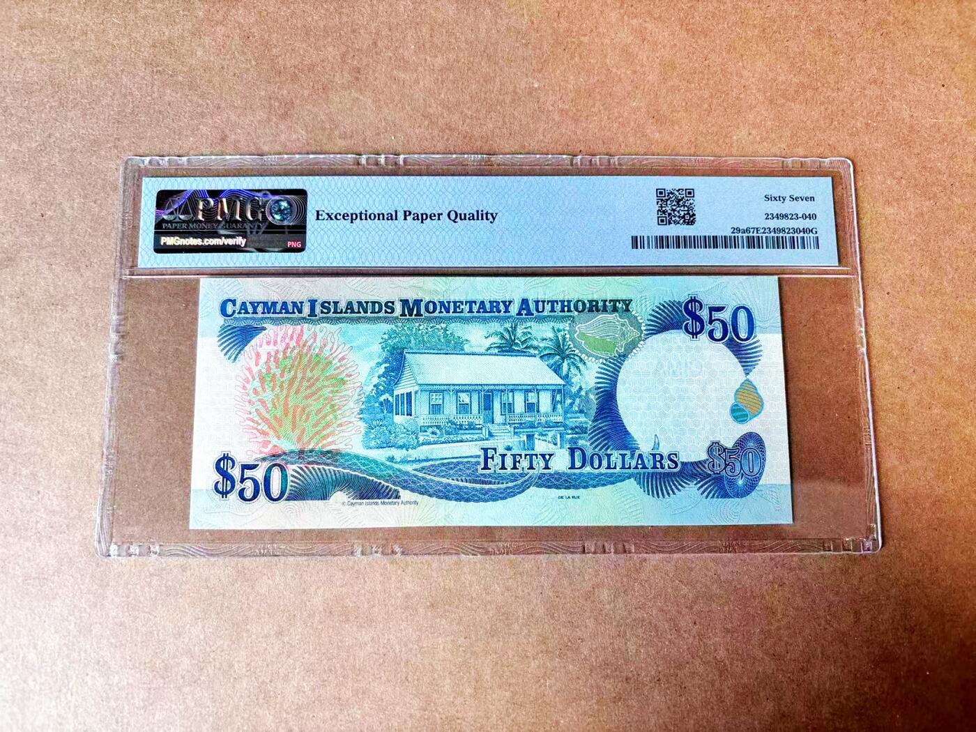 【Blue Auction】世界纸币精拍第765期——18级TOP拍卖/信誉/品质/专业/高效💫 【C/1首发冠 661倒置小号】开曼群岛 2001年50元 女王 PMG67EPQ 高分