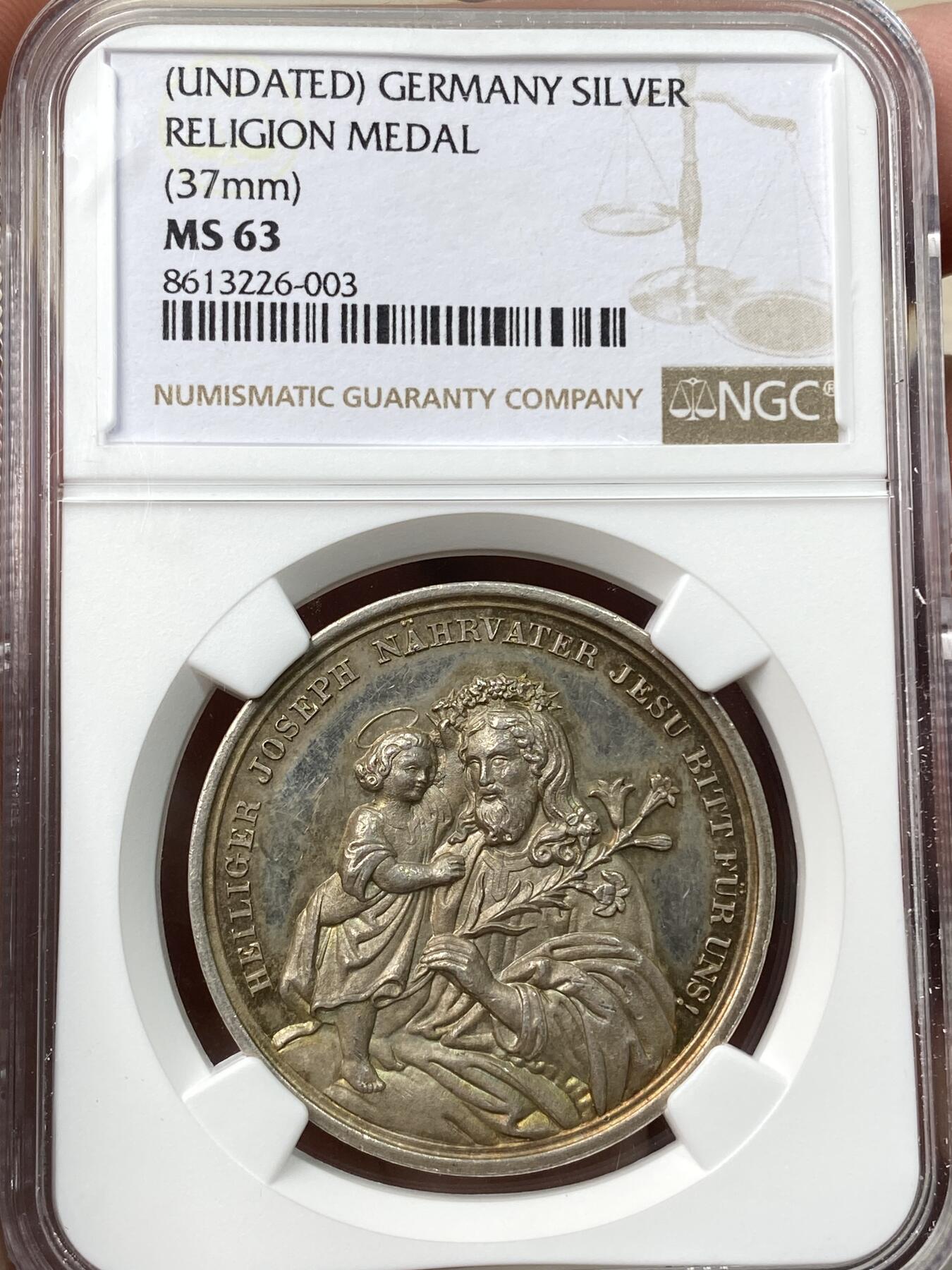 万国钱币拍卖第058期（万国新年大拍） NGC MS63 19世纪德国新教宗教纪念大银章 圣子为耶稣献上花环 圣灵当空照耀 宗教表现力拉满 绿幽灵般油润的沁入式包浆非常赏心悦目 首见品种唯一冠军分