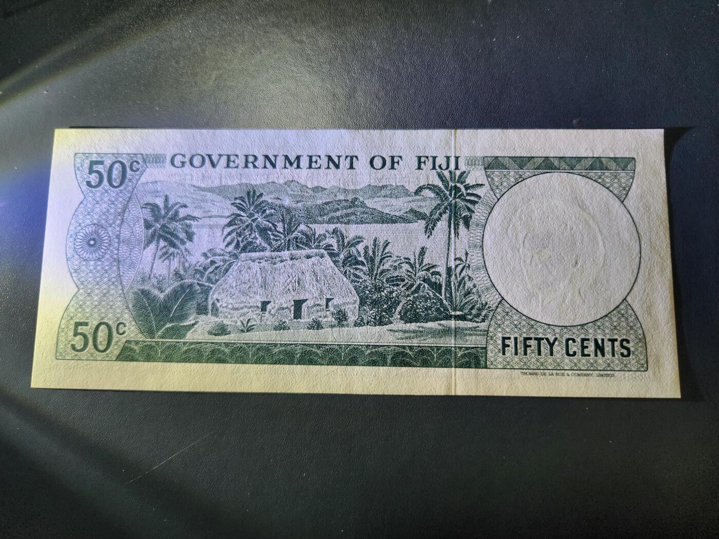 12月21号晚上8点 外国纸币自动截拍第75场 东加勒比50分新品