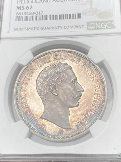 万国钱币拍卖第058期（万国新年大拍） NGC MS62 1890年德国威廉二世通过与英国签订《赫尔戈兰条约》将赫尔戈兰群岛纳入帝国版图纪念大银章 罕见品种 火烧云七色幻彩镜面喷砂质感 38MM