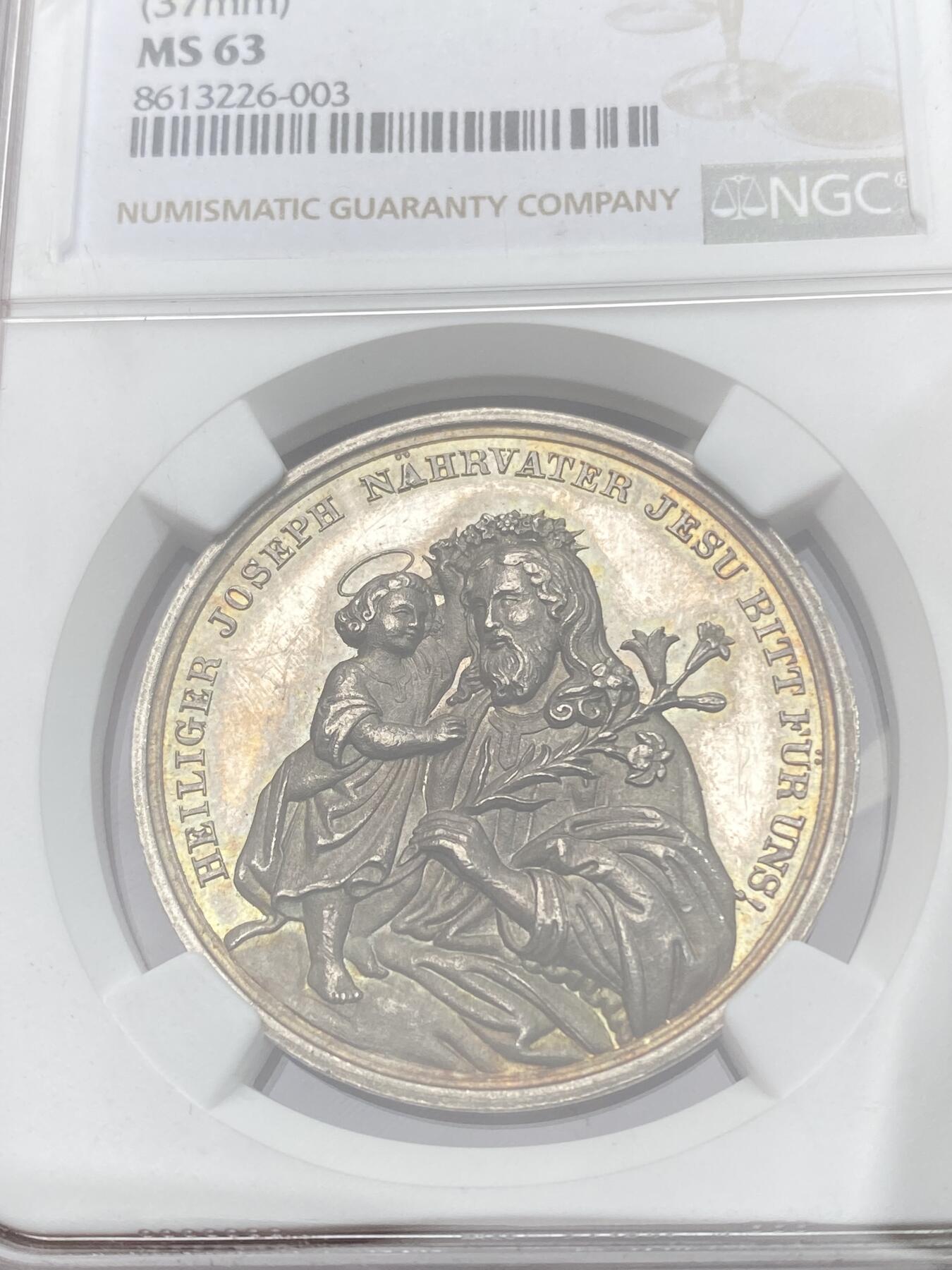 万国钱币拍卖第058期（万国新年大拍） NGC MS63 19世纪德国新教宗教纪念大银章 圣子为耶稣献上花环 圣灵当空照耀 宗教表现力拉满 绿幽灵般油润的沁入式包浆非常赏心悦目 首见品种唯一冠军分