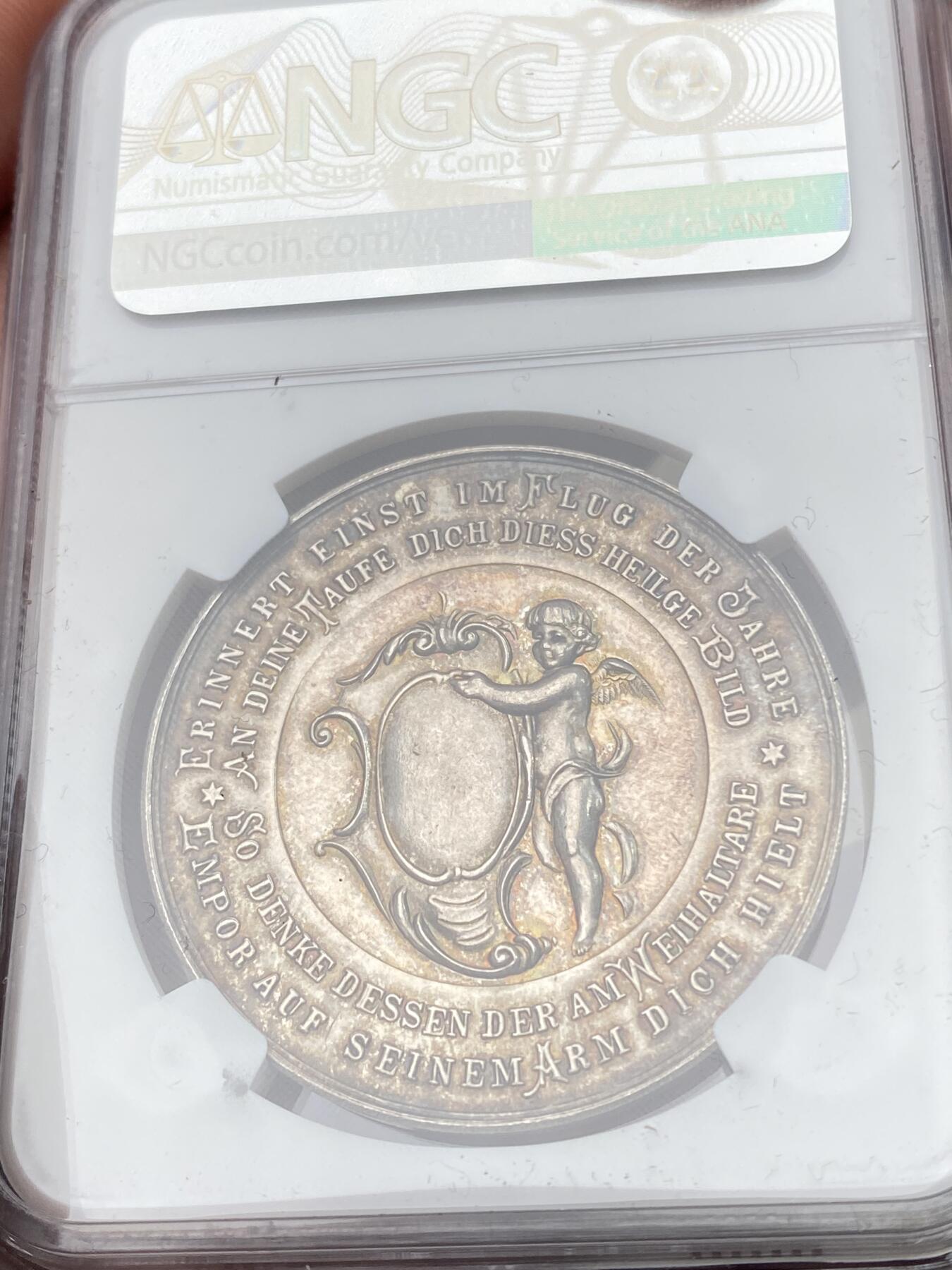 万国钱币拍卖第058期（万国新年大拍） NGC MS63 19世纪奥地利洗礼纪念大银章 正面为约翰为耶稣在约旦河施洗 背面小天使手持盾徽未签名未使用款原味极其精美