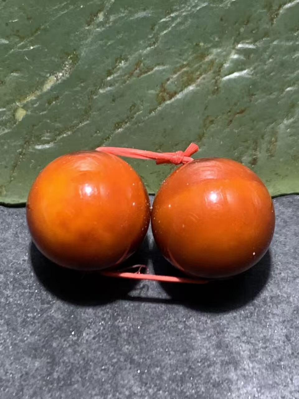 精美高玉化枣红缠丝玛瑙腰珠一对，。