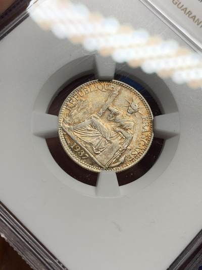 《竞宝斋》第449场 周日，周一，周二  3场连拍 （全场包邮，欢迎送拍） NGC MS62 法属印支1937年十分银币，带漂亮的黄包浆，经典品种