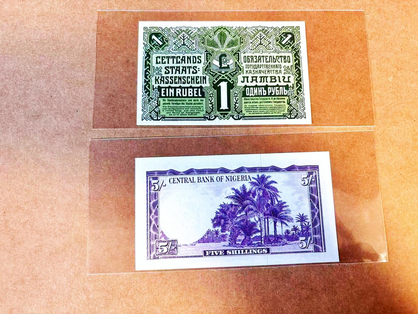 【Blue Auction】世界纸币精拍第766期——18级TOP拍卖/信誉/品质/专业/高效💫 【一组2张 均p2】尼日利亚1958年5先令 棕榈树河景 雄狮水印 典雅丁香紫色调 自治联邦首张纸币&拉脱维亚1919年1卢布 草木纹饰 均全新UNC