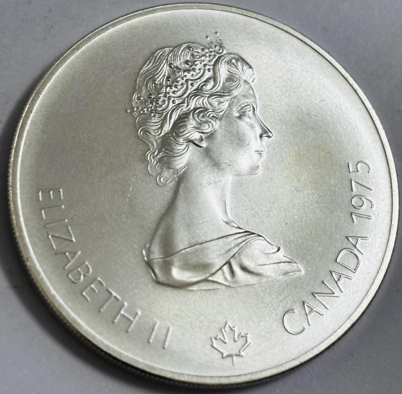 文馨钱币收藏第 286 场，圣诞节专场【 长期接收代拍品低至 0 佣金】 少见全新 1975 年加拿大第 21 届夏季奥林匹克运动会蒙特利尔标枪系列 5 元精制大银币 24.3 克 925 高银