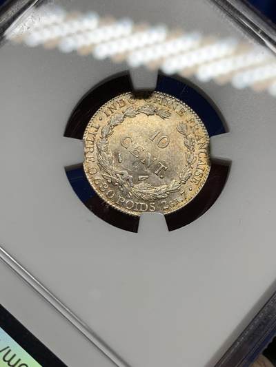 《竞宝斋》第449场 周日，周一，周二  3场连拍 （全场包邮，欢迎送拍） NGC MS62 法属印支1937年十分银币，带漂亮的黄包浆，经典品种