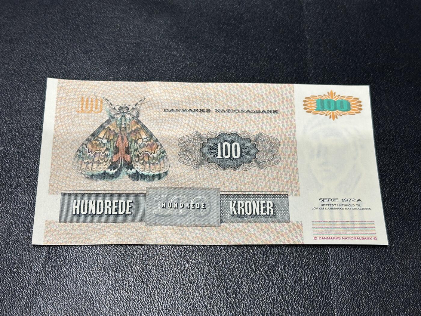 《外钞收藏家》第五百九十六期（精品大拍场）（本平台长期征集拍品、欢迎藏友们联系合作） 丹麦1997年绘画版100克朗（经典大蛾子）	UNC