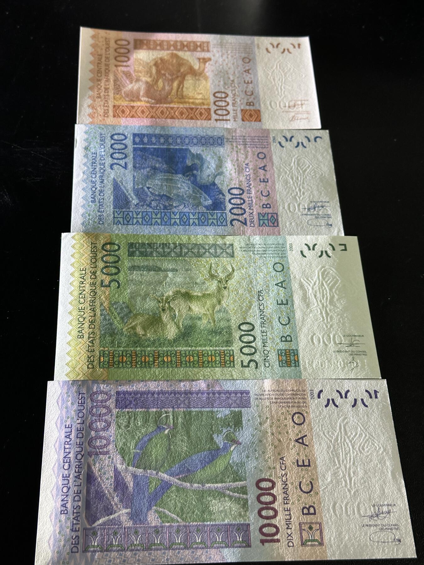 《外钞收藏家》第五百九十六期（精品大拍场）（本平台长期征集拍品、欢迎藏友们联系合作） 西非共同体（B字母贝宁）1000-1万法郎四张一套（稀少国家品种）	UNC