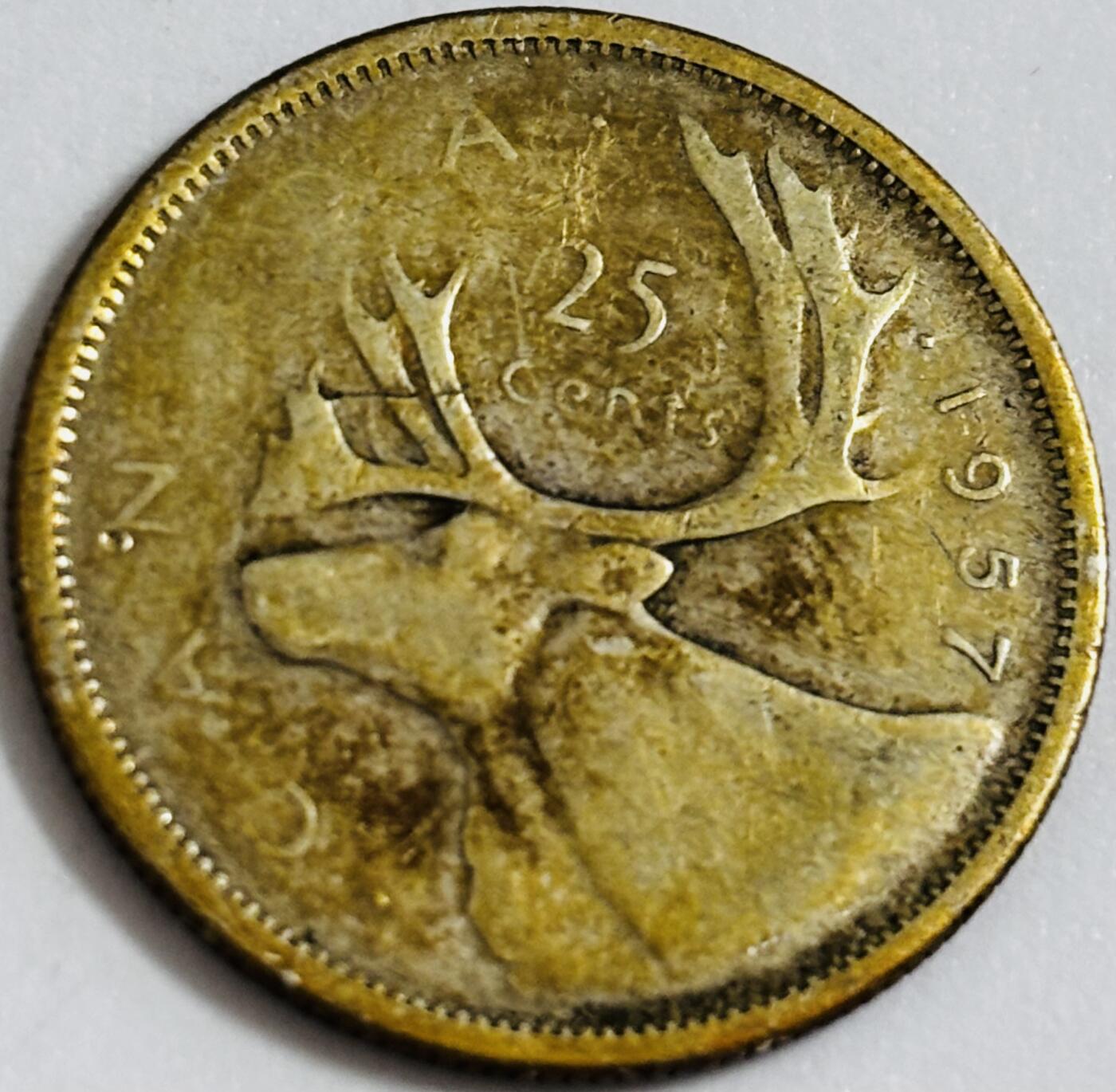 文馨钱币收藏第 286 场，圣诞节专场【 长期接收代拍品低至 0 佣金】 焦黄包浆 1957 年英属加拿大 25 分银币，第一版 800 银