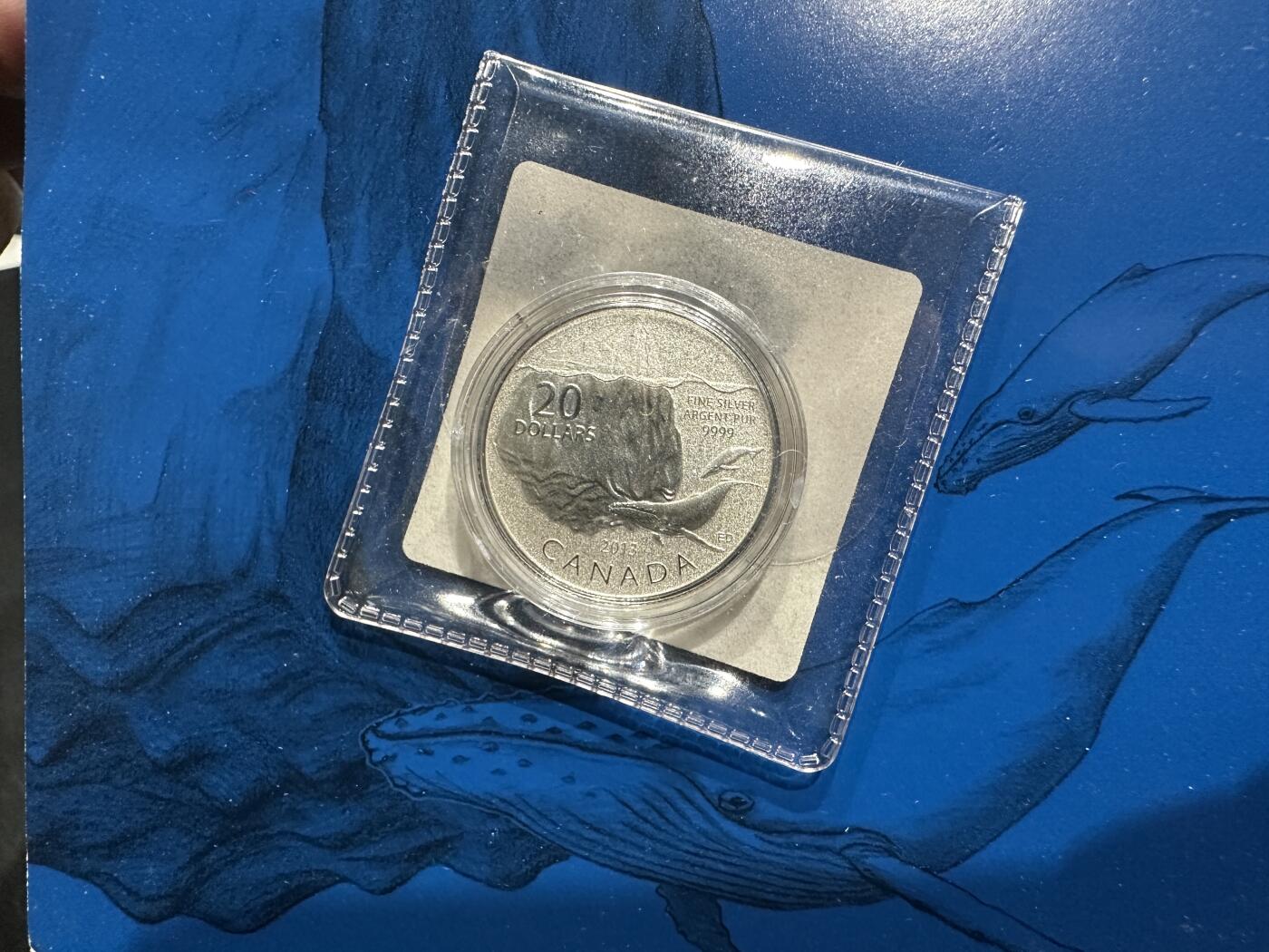 《外钞收藏家》第五百九十六期（精品大拍场）（本平台长期征集拍品、欢迎藏友们联系合作） 加拿大2013年20加元鲸鱼保护与冰山卡装纪念精制银币（8g纯银）