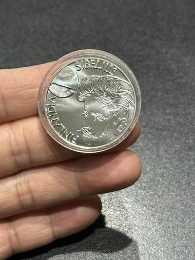 《外钞收藏家》第五百九十六期（精品大拍场）（本平台长期征集拍品、欢迎藏友们联系合作） - 芬兰1999年100马克著名音乐家西贝柳斯纪念银币（22克925银）