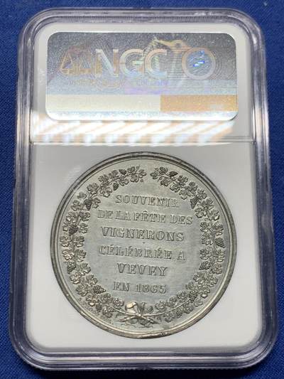 《竞宝斋》第449场 周日，周一，周二  3场连拍 （全场包邮，欢迎送拍） NGC UNC 瑞士 1865年 韦威葡萄酒节 锌章 小胖孩细节细腻 保存的非常好