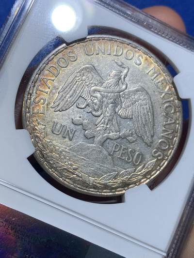 《竞宝斋》第449场 周日，周一，周二  3场连拍 （全场包邮，欢迎送拍） NGC AUD 墨西哥 1913年 1比索 银币 骑马鹰洋中的少见年份 细节美 已有五彩包浆 大热品种