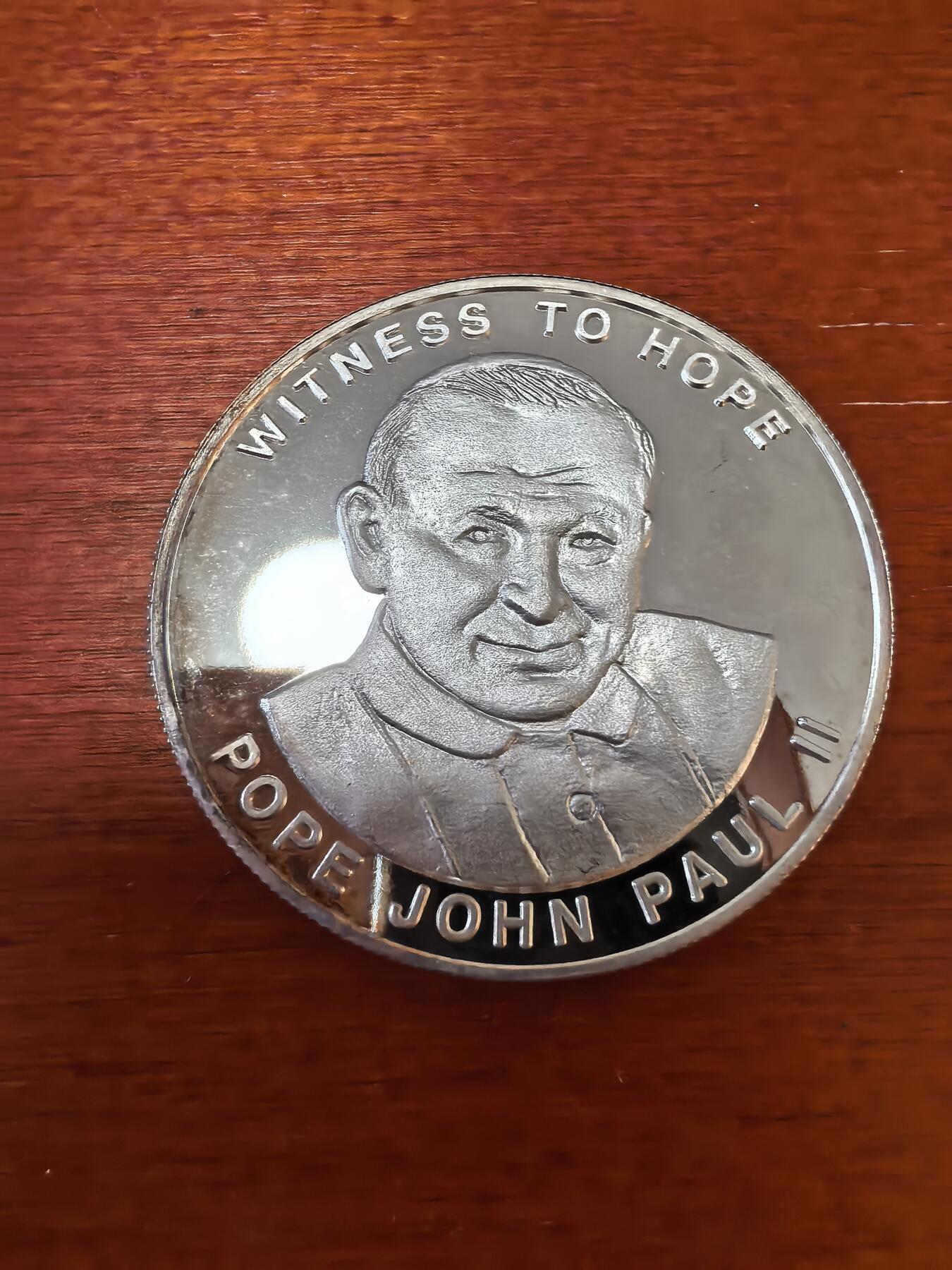 长老汇蛇年精选第八十五场拍卖  2002乌干达教皇保罗二世1000先令铜镀银精制币，克书未记载