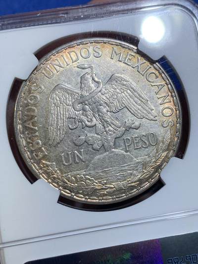 《竞宝斋》第449场 周日，周一，周二  3场连拍 （全场包邮，欢迎送拍） NGC AUD 墨西哥 1913年 1比索 银币 骑马鹰洋中的少见年份 细节美 已有五彩包浆 大热品种