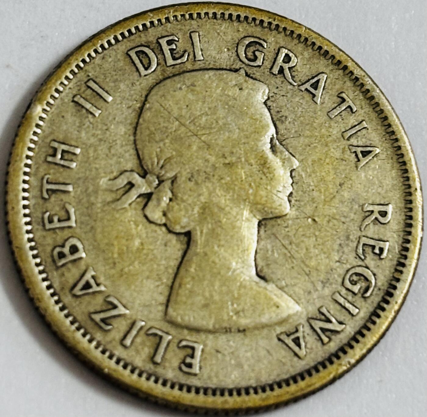 文馨钱币收藏第 286 场，圣诞节专场【 长期接收代拍品低至 0 佣金】 焦黄包浆 1957 年英属加拿大 25 分银币，第一版 800 银