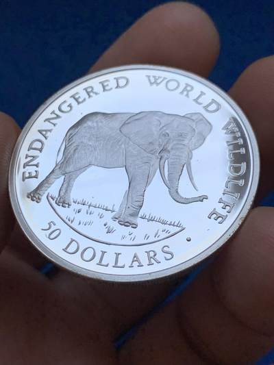 《竞宝斋》第449场 周日，周一，周二  3场连拍 （全场包邮，欢迎送拍） 库克群岛1990年濒危野生动物-非洲大象50美元银币 925银 19.8克