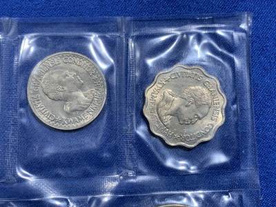 《竞宝斋》第449场 周日，周一，周二  3场连拍 （全场包邮，欢迎送拍） 加纳 1958与1965年 7枚五星套币  此类封装币少见 细节见图