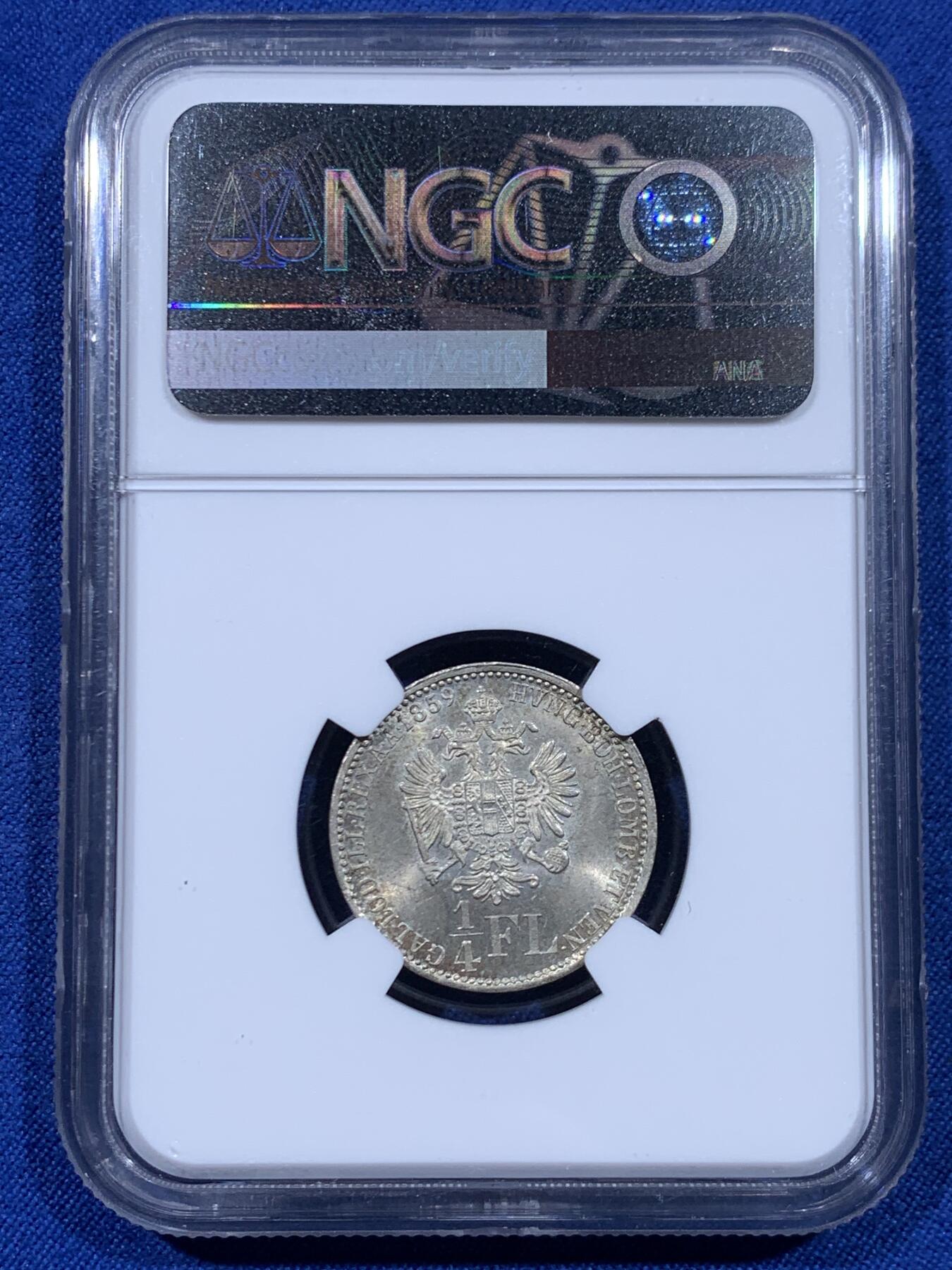 《竞宝斋》第450场 周日，周一，周二  3场连拍 （全场包邮，欢迎送拍） NGC MS64 奥地利1859年1/4弗罗林银币 完整漂亮的原光淡黄包浆 64也很不容易达到了 弗朗茨约瑟夫改用弗罗林币制初期 第三版年轻头像 双头鹰纹章哈布斯堡-奥地利-洛林盾徽