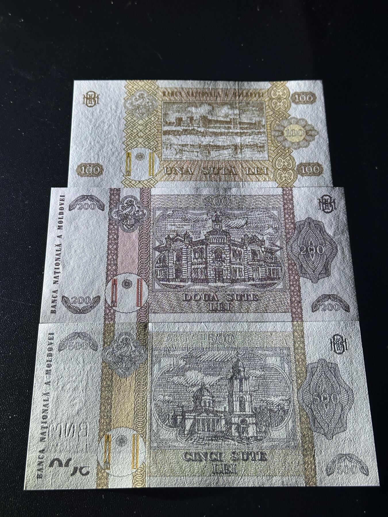 《外钞收藏家》第五百九十六期（精品大拍场）（本平台长期征集拍品、欢迎藏友们联系合作） 摩尔多瓦100、200、500 三张一起 全新UNC 