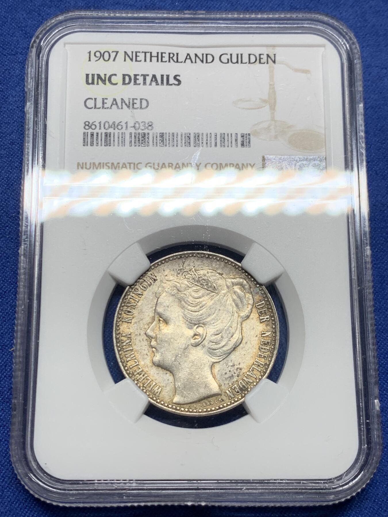《竞宝斋》第450场 周日，周一，周二  3场连拍 （全场包邮，欢迎送拍） NGC UNCD 荷兰1907威廉敏娜少女头银币，好品相，轻度清洗痕迹，这个品种上UNC本来就已经非常不容易了，品相不错