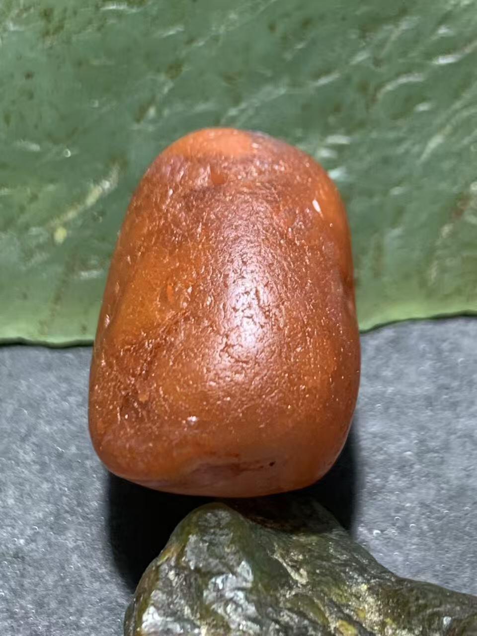 精美荔枝冻柿子红水冲籽川料南红玛瑙原石一颗