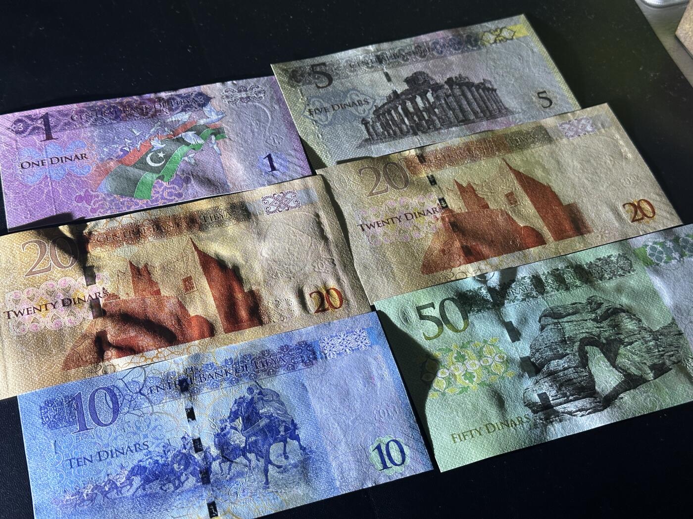 《外钞收藏家》第五百九十六期（精品大拍场）（本平台长期征集拍品、欢迎藏友们联系合作） 利比亚1-50第纳尔 六张（20有两个版本）全新UNC 