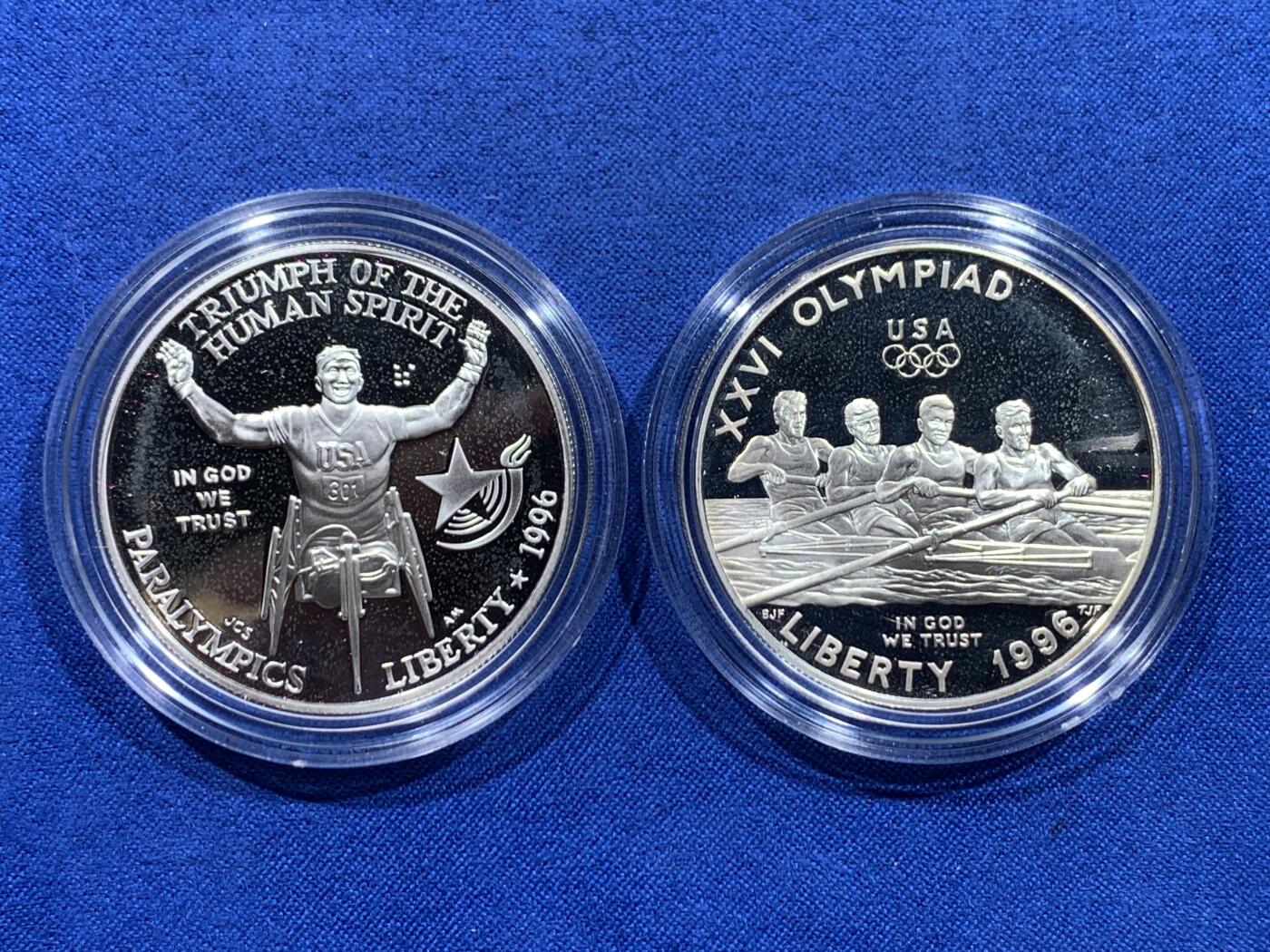 《竞宝斋》第450场 周日，周一，周二  3场连拍 （全场包邮，欢迎送拍） 美国1996年1美元2枚装精制银币套 亚特兰大奥运会 原盒 900银 26.73克X2