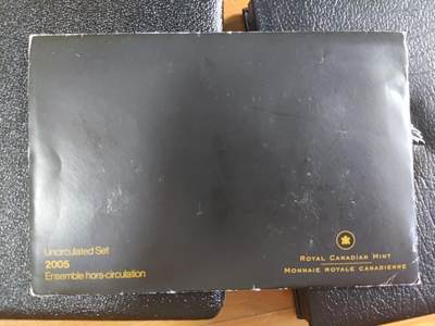 长老汇蛇年精选第八十六场拍卖 - 2006加拿大7枚套币原厂塑封装带外纸，总面值3.91加元，其中2加元双色币克书标价30美金