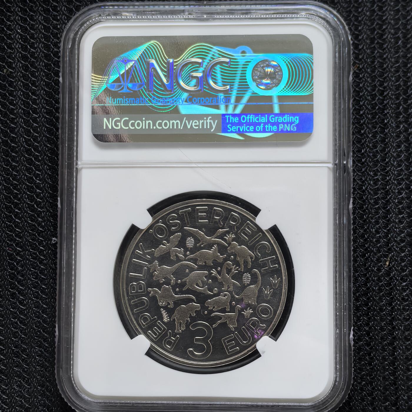 道一币馆币章第一百六十场 NGC 满分MS70 奥地利2021年恐龙系列亚伯达戟龙夜光彩色铜镍3欧元纪念币