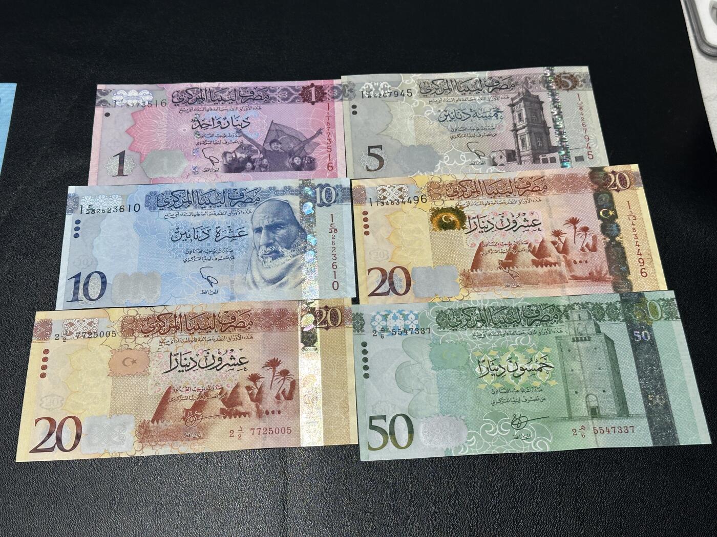 《外钞收藏家》第五百九十六期（精品大拍场）（本平台长期征集拍品、欢迎藏友们联系合作） 利比亚1-50第纳尔 六张（20有两个版本）全新UNC 