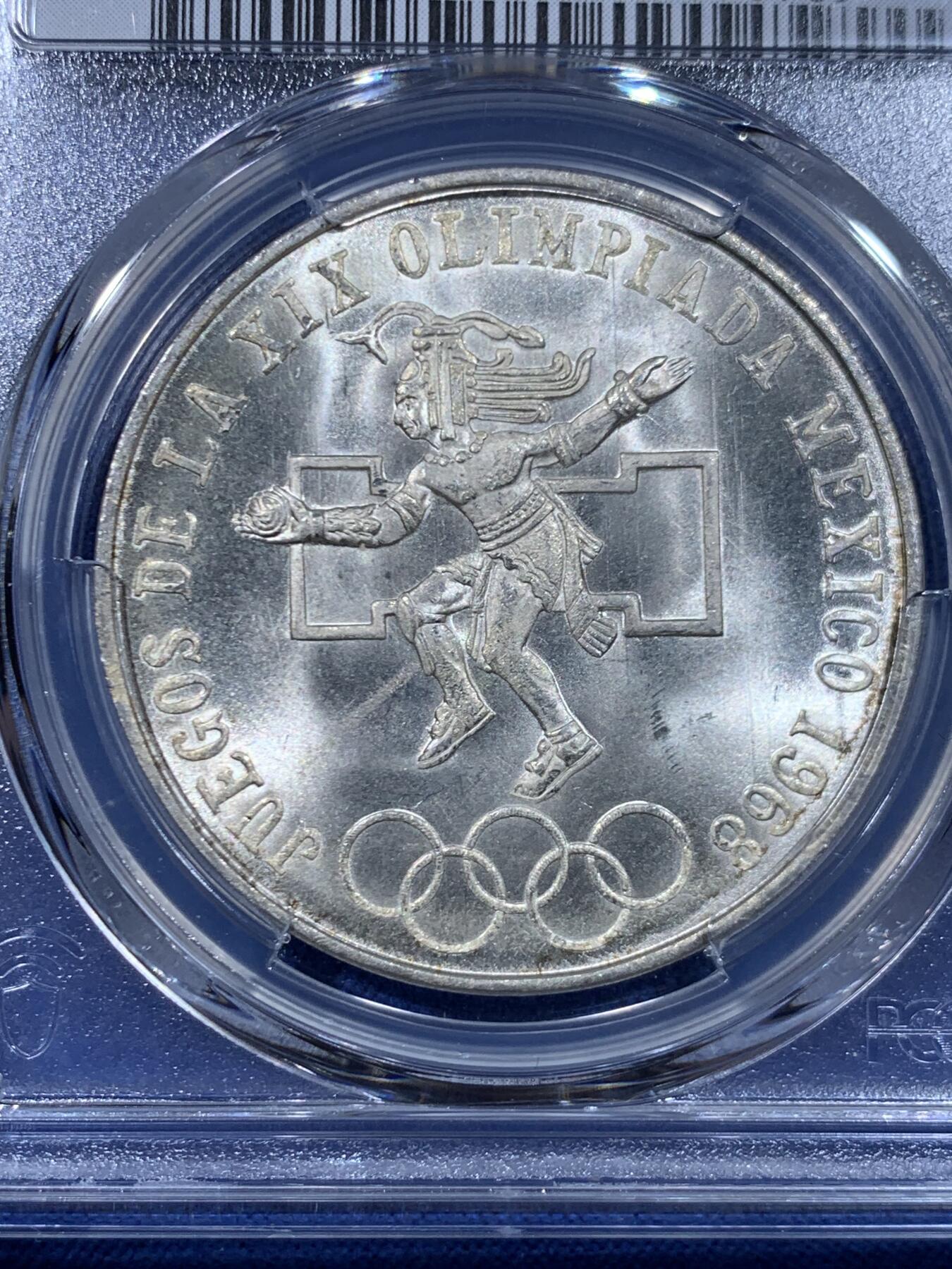 《竞宝斋》第450场 周日，周一，周二  3场连拍 （全场包邮，欢迎送拍） PCGS MS67 墨西哥1968年25比索 奥运纪念，经典品种，卷拆品高分，两面爆光，赏心悦目，适合收藏