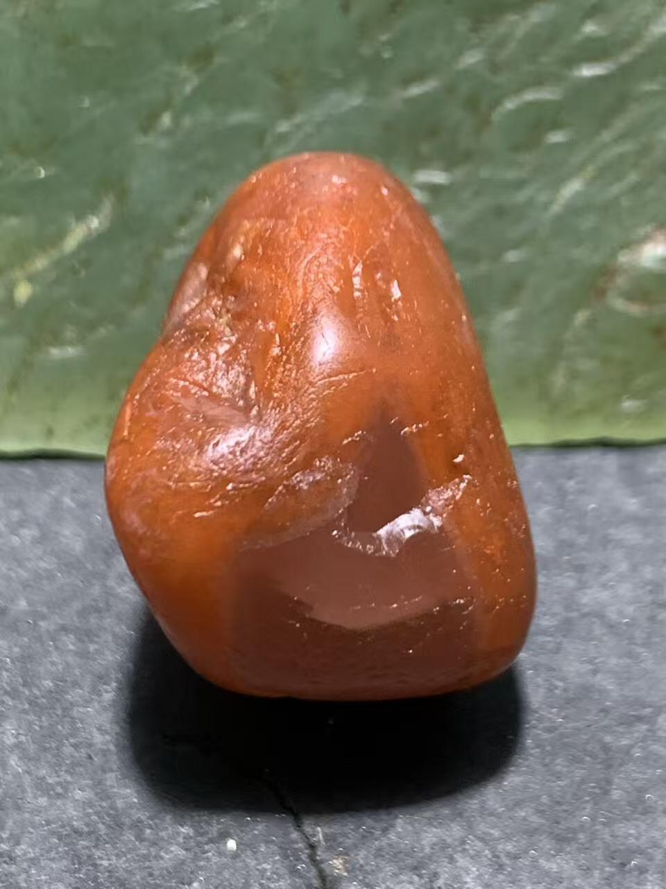 精美荔枝冻柿子红水冲籽川料南红玛瑙原石一颗