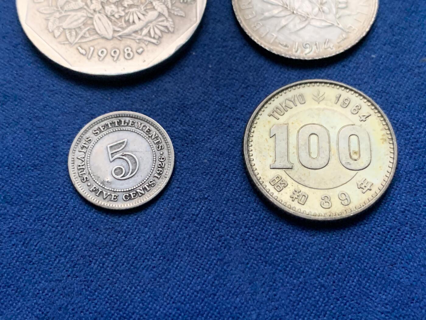 《竞宝斋》第450场 周日，周一，周二  3场连拍 （全场包邮，欢迎送拍） 四枚一组 英属印度1926爱七5分银币+日本昭和39年小奥银币+法国1914年行走女神1法郎银币+中非货币联盟1998年500法朗