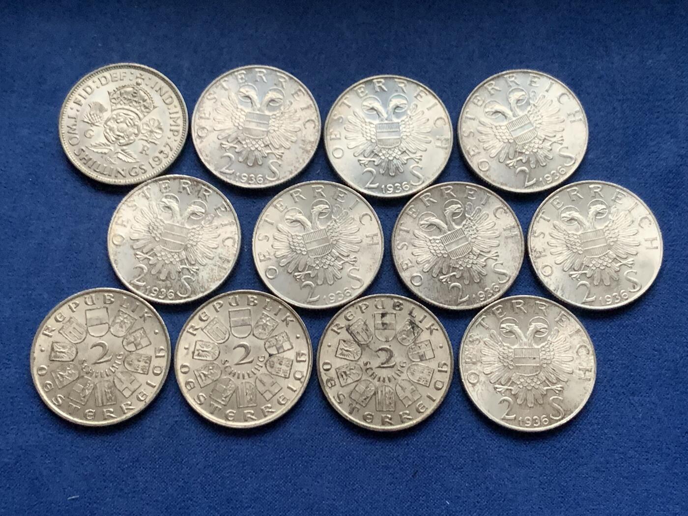 《竞宝斋》第450场 周日，周一，周二  3场连拍 （全场包邮，欢迎送拍） 12枚一组 奥地利萨沃伊王子尤金逝世200周年2先令银币 640银（8枚96克） + 奥地利1929年西奥多·比尔罗斯诞辰100周年2先令银币 640银（3枚36克）+ 英国1937年乔治六世2先令银币 500银（1枚11.3克）