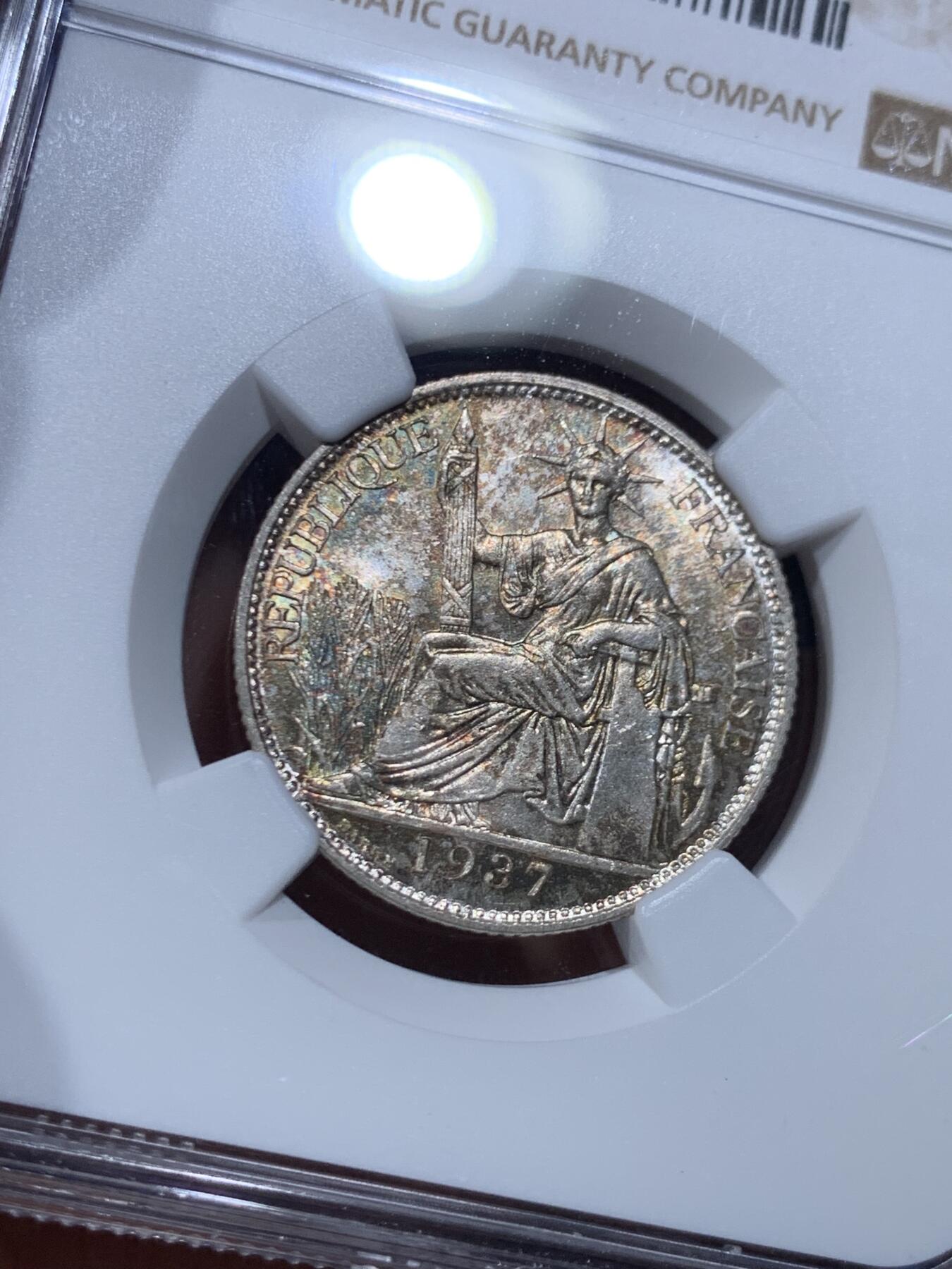 《竞宝斋》第450场 周日，周一，周二  3场连拍 （全场包邮，欢迎送拍） NGC MS63 法属印支1937年二十分银币，带漂亮的包浆，经典品种