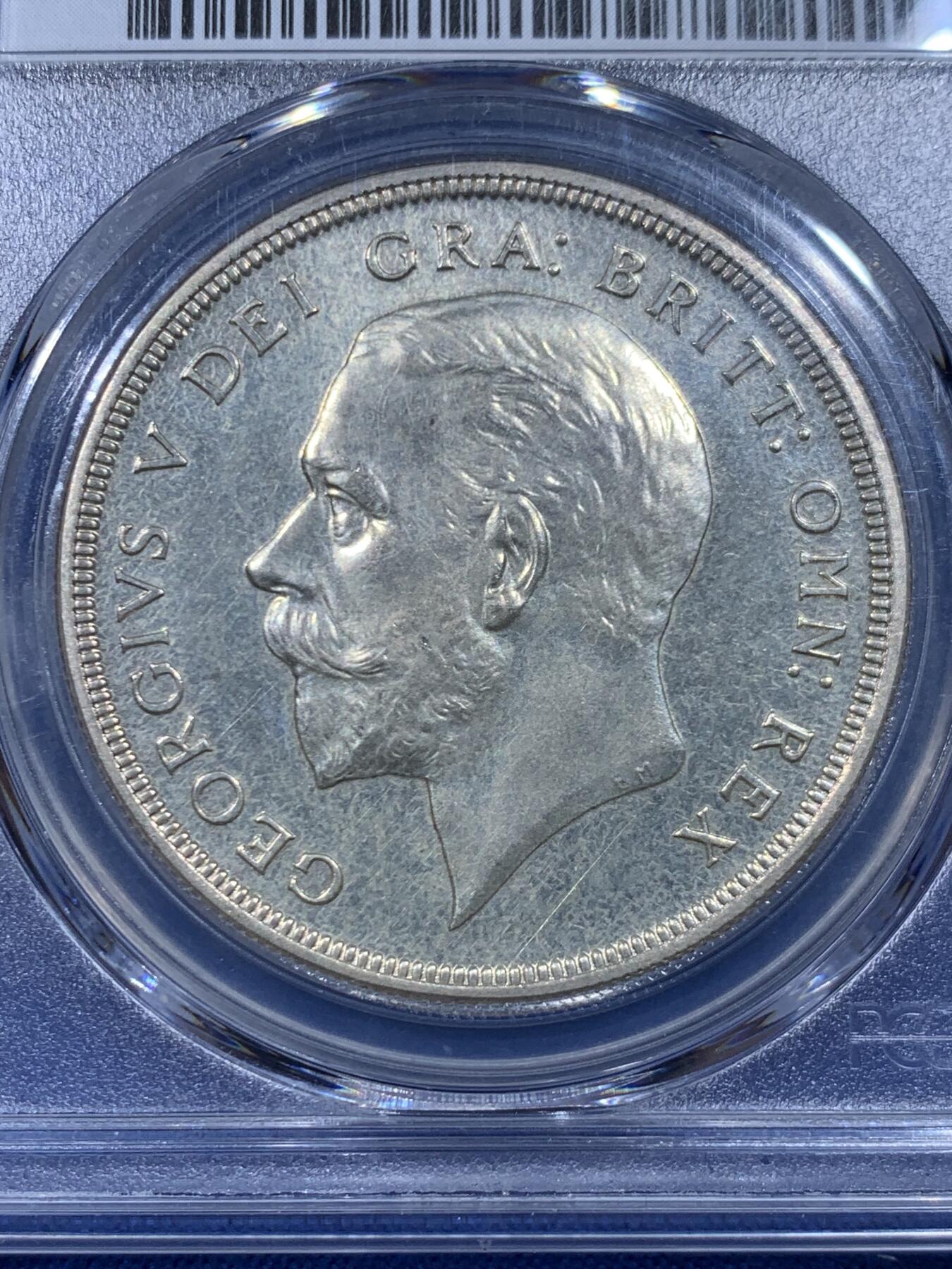 《竞宝斋》第450场 周日，周一，周二  3场连拍 （全场包邮，欢迎送拍） PCGS PR63 英国1927年乔治五世精制花冠1克朗银币 背面支撑有磕