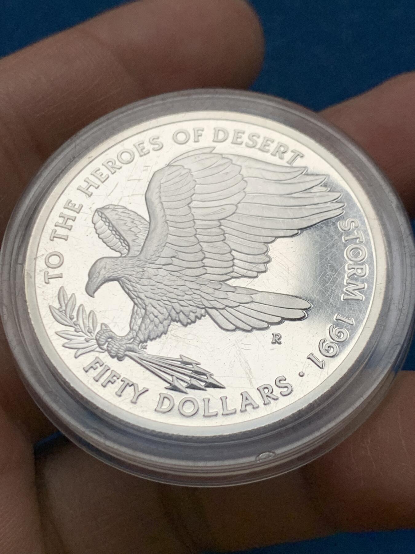 《竞宝斋》第450场 周日，周一，周二  3场连拍 （全场包邮，欢迎送拍） 马绍尔群岛1991年沙漠风暴英雄大银币 31.45g 999银