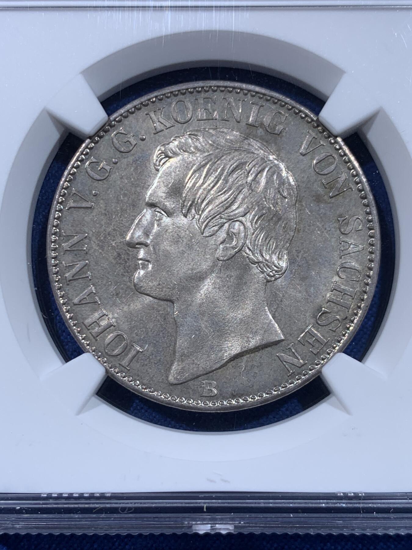 《竞宝斋》第450场 周日，周一，周二  3场连拍 （全场包邮，欢迎送拍） 唯一冠军分 NGC MS65 德国 1862年 萨克森王国 约翰一世 泰勒银币  14.5万的发行量 这个状态确实不可错过