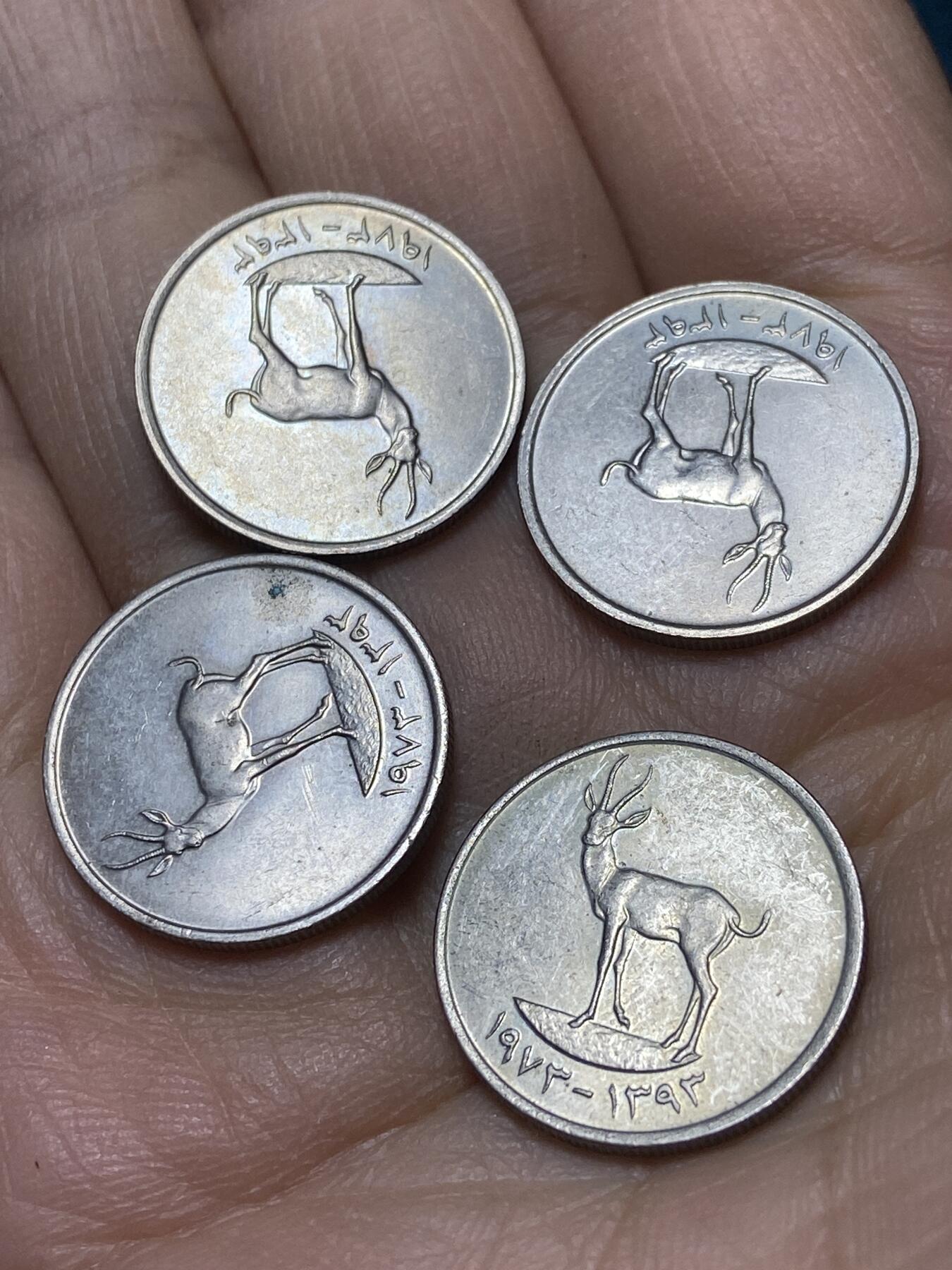 2025年第一百四十五场(总第一百七十一场）高品质英国一线回流散币年末特拍场第二场(免佣金) 原光未流通–阿联酋🇦🇪1973年25费尔4枚