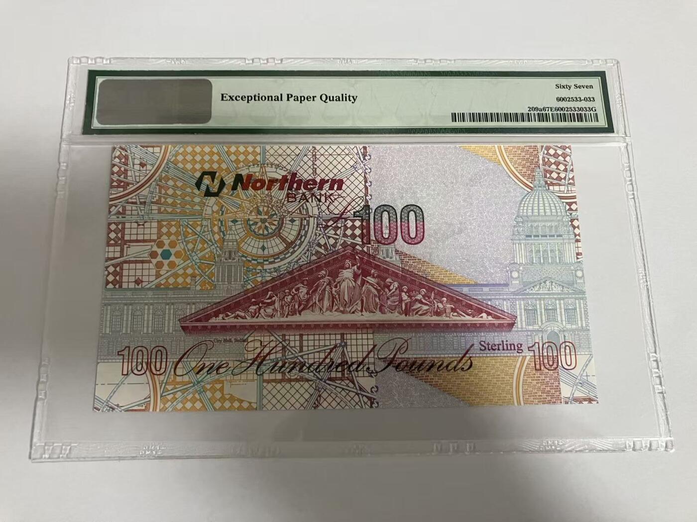 《外钞收藏家》第五百九十六期（精品大拍场）（本平台长期征集拍品、欢迎藏友们联系合作） 2005年北爱尔兰100镑 詹姆斯 马丁爵士 PMG67