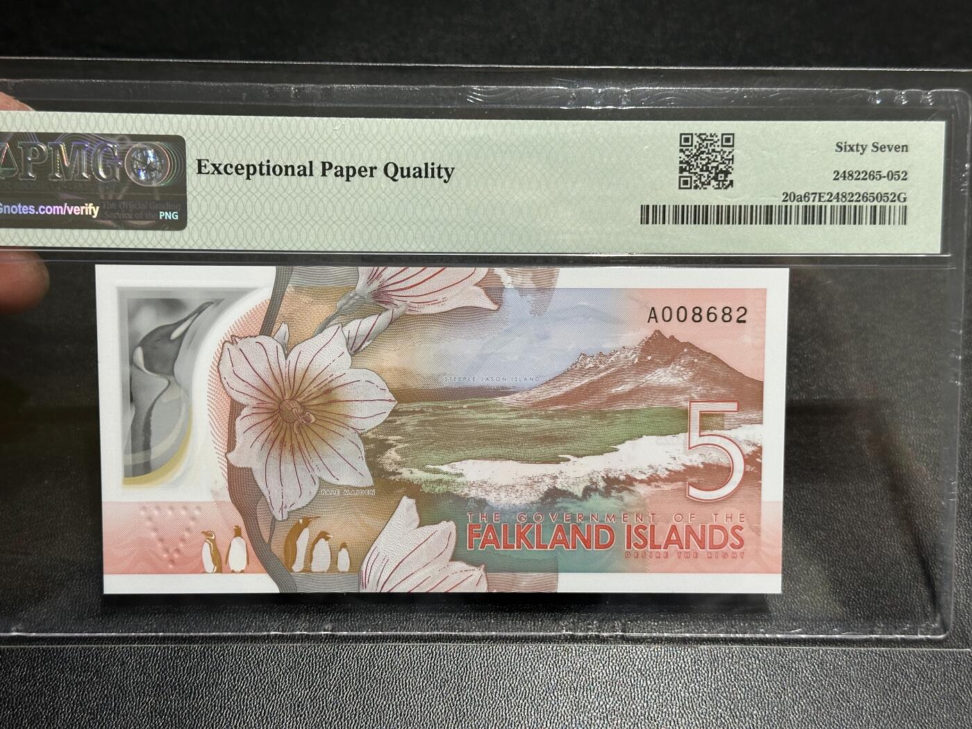 《外钞收藏家》第五百九十六期（精品大拍场）（本平台长期征集拍品、欢迎藏友们联系合作） 2025年福克兰群岛5镑 PMG67 A冠 无47 朦胧号