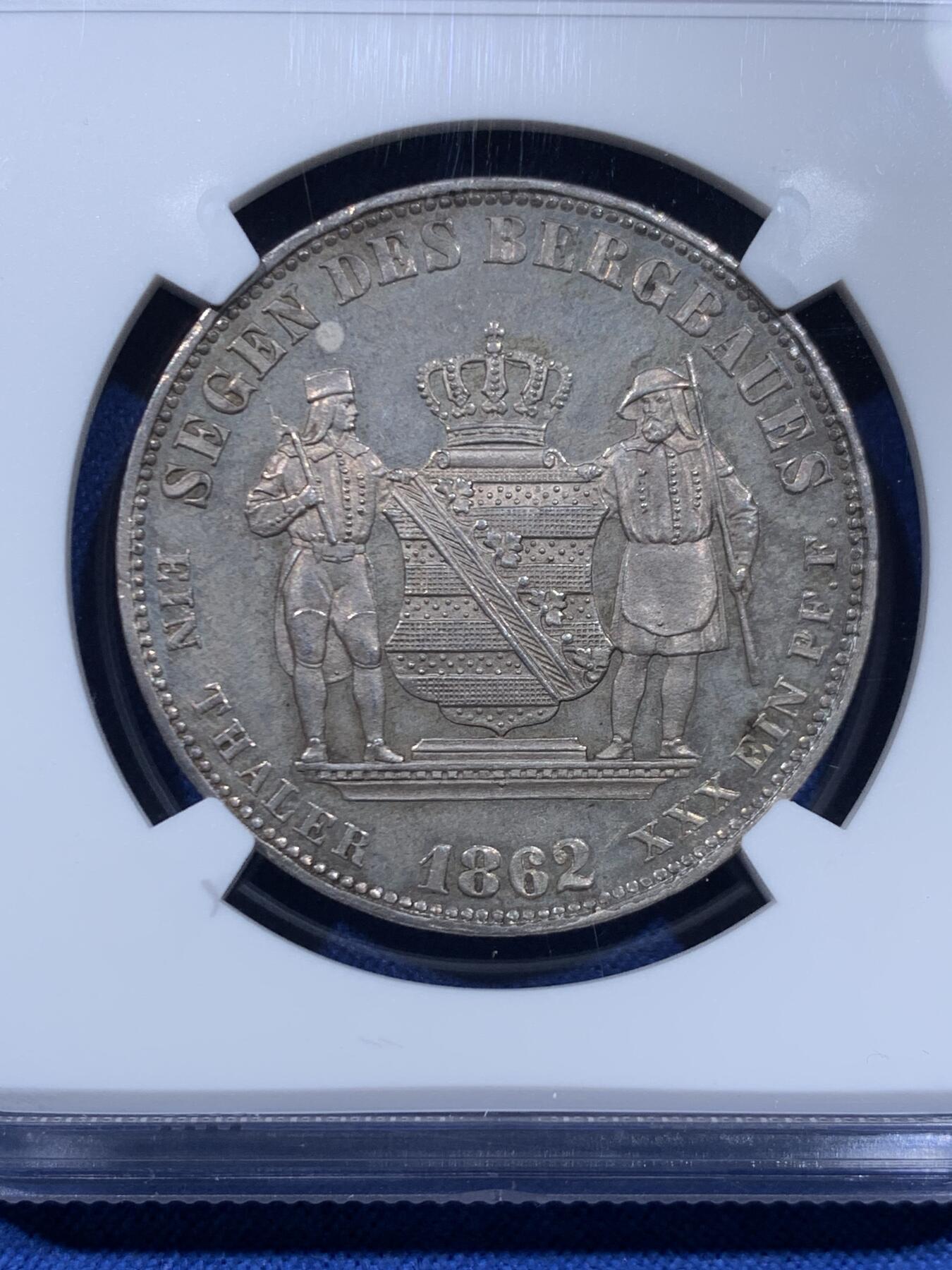 《竞宝斋》第450场 周日，周一，周二  3场连拍 （全场包邮，欢迎送拍） 唯一冠军分 NGC MS65 德国 1862年 萨克森王国 约翰一世 泰勒银币  14.5万的发行量 这个状态确实不可错过