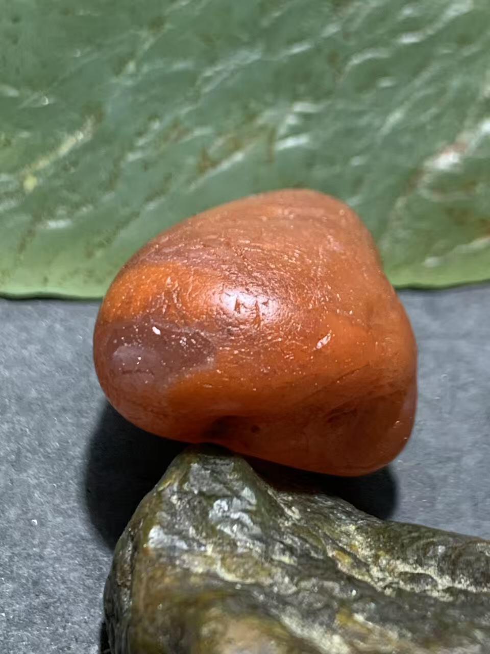 精美荔枝冻柿子红水冲籽川料南红玛瑙原石一颗