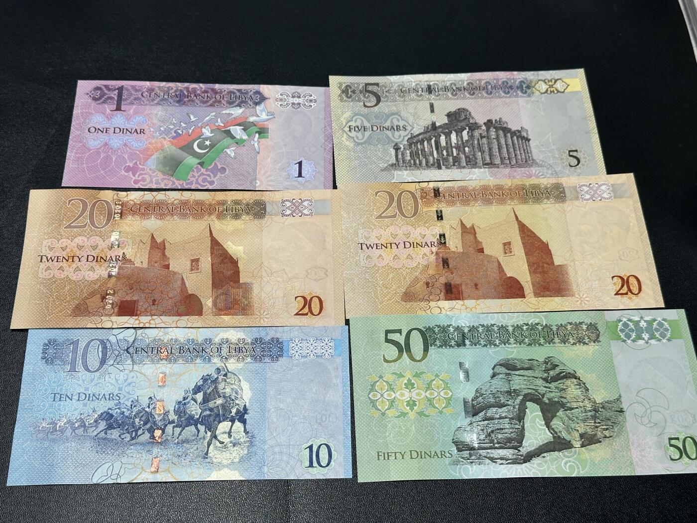 《外钞收藏家》第五百九十六期（精品大拍场）（本平台长期征集拍品、欢迎藏友们联系合作） 利比亚1-50第纳尔 六张（20有两个版本）全新UNC 