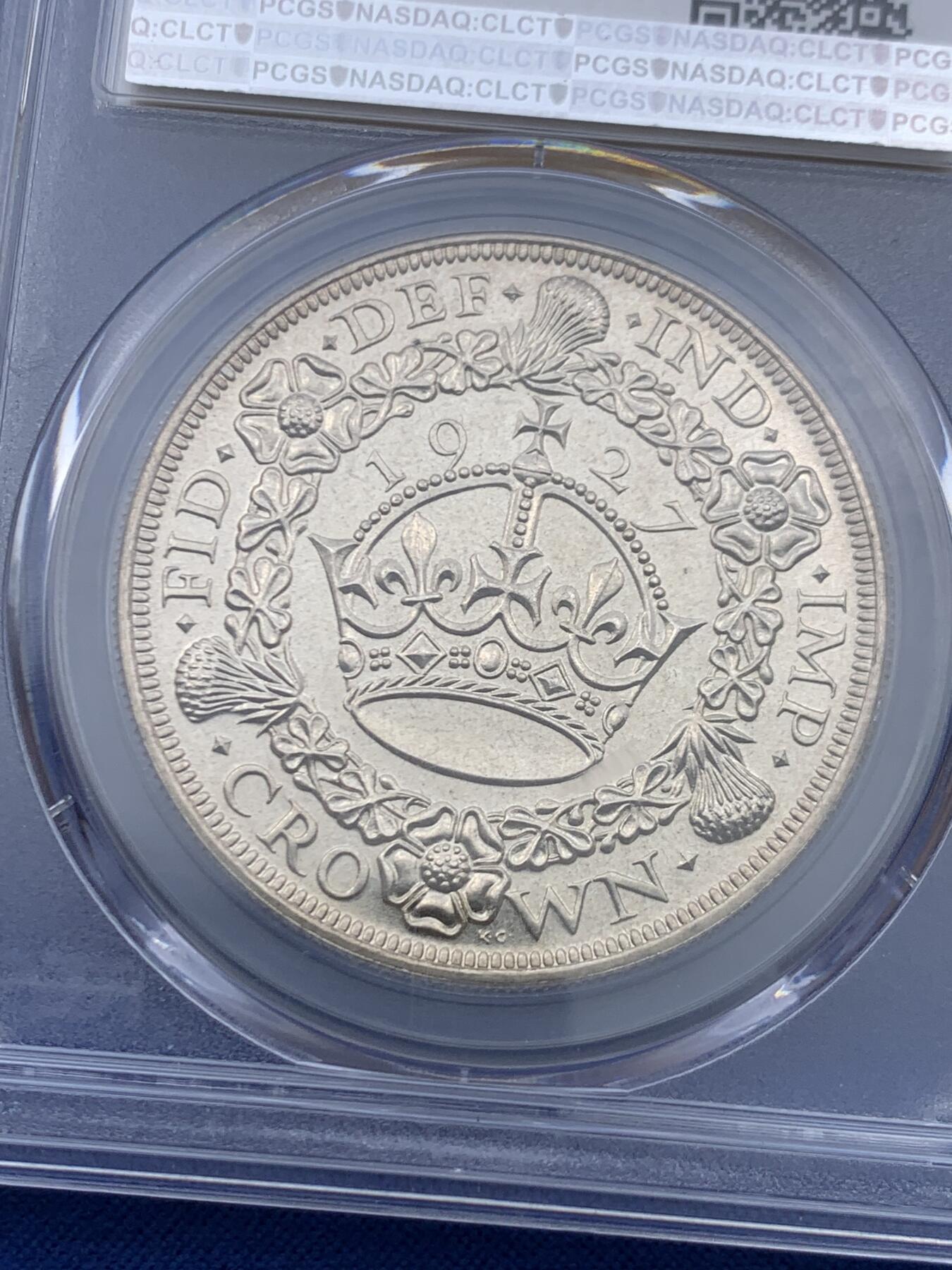 《竞宝斋》第450场 周日，周一，周二  3场连拍 （全场包邮，欢迎送拍） PCGS PR63 英国1927年乔治五世精制花冠1克朗银币 背面支撑有磕