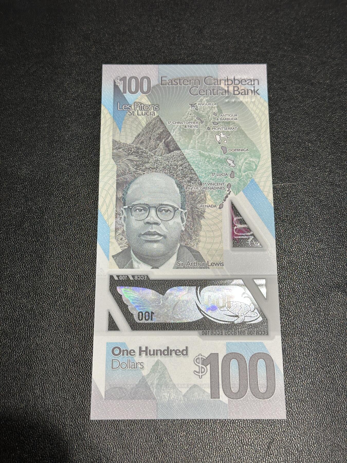 《外钞收藏家》第五百九十七期（年底收官场）（本平台长期征集拍品、欢迎藏友们联系合作） 2019年东加勒比100元 全新UNC