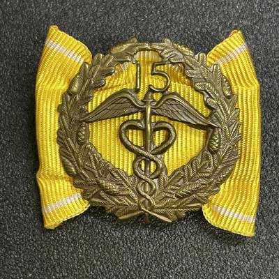 西秦中古拍卖第七十期 - 芬兰商会服务15年奖章 背面有厂标