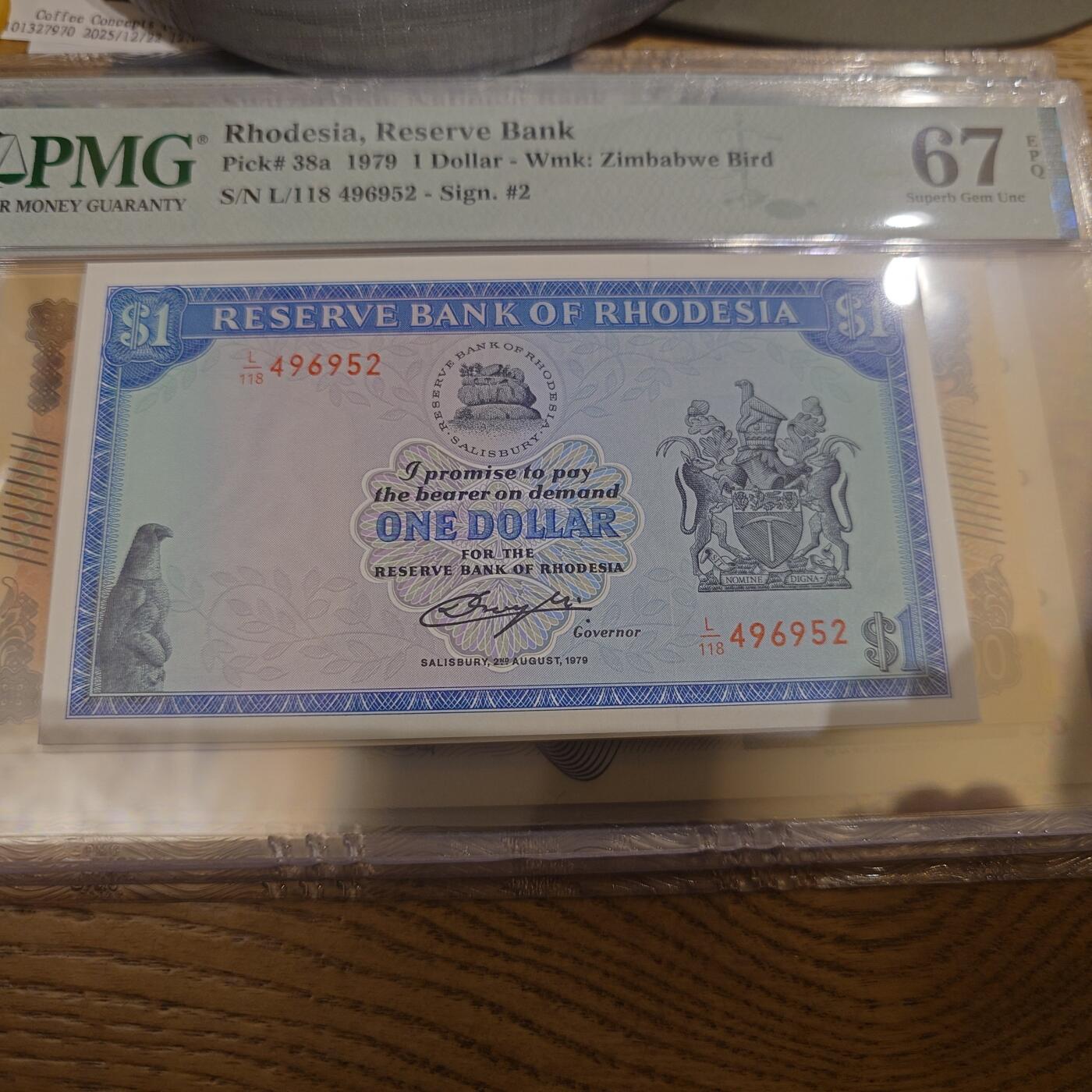 世界钱币～微拍第221期暨2025年第61期  最新货品（群里先挑剩）选购 1979年罗德西亚1元 PMG67E尾号952